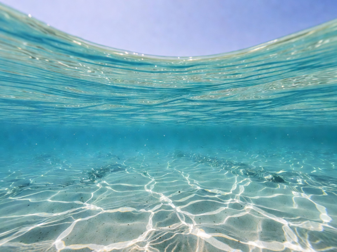 Clear pristine seawater flowing near yacht hull representing desalination quality